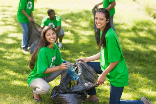Workers managing waste segregation during commercial clearance
